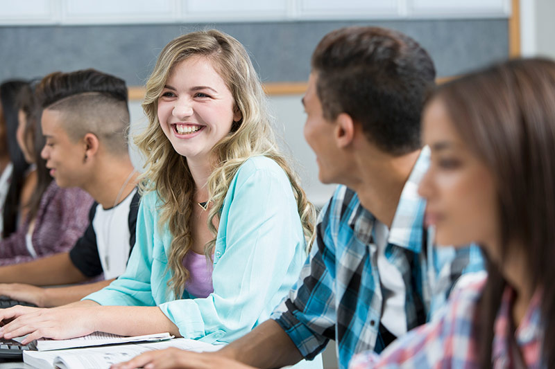 Group of teenagers in a classroom